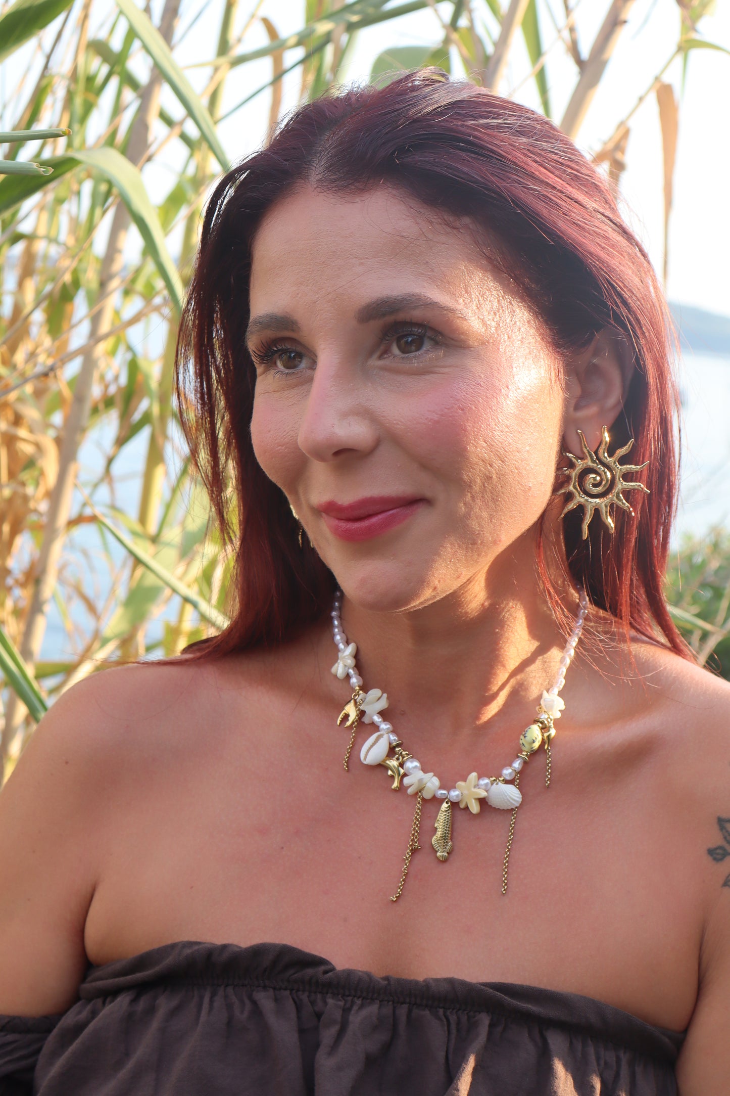 Boucle d’oreille soleil
